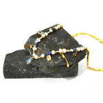 Multi Gemstone Pearl Necklace, a timeless piece featuring classic gemstones and pearls, offering a refined and sophisticated look that stands the test of time