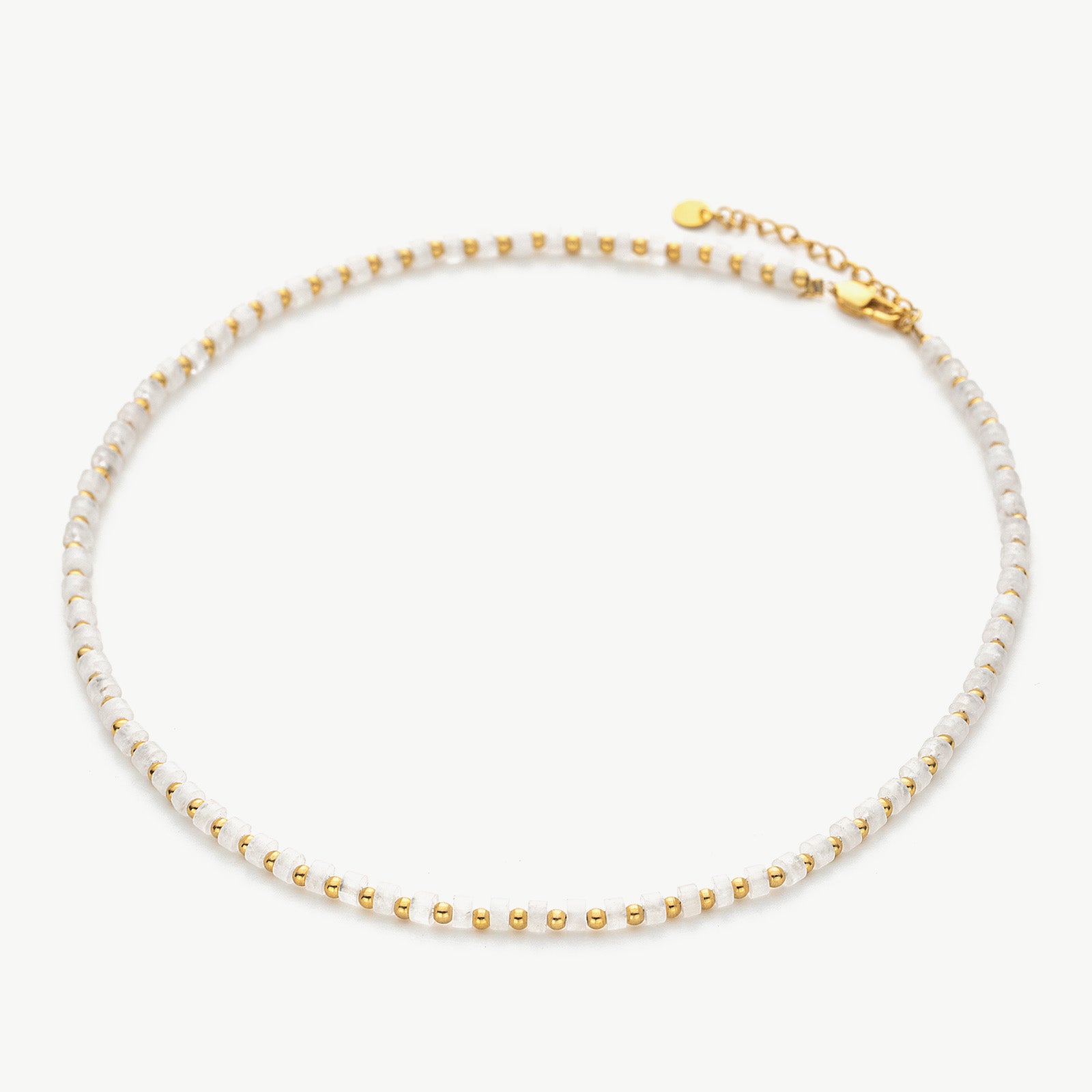 Gold Stone Beaded Necklace, symbolizing opulent beauty, this necklace showcases the richness of gold and the timeless allure of stones, creating a sophisticated and versatile accessory.