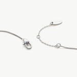 Platinum Crystal Drop Necklace in Spinel Purple, an enchanting spinel purple glow that radiates elegance, featuring a crystal drop pendant in a royal purple hue, creating a timeless and stylish accessory