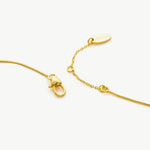 Gold Ruby Crystal Drop Necklace, a chic ruby accent to elevate your style, featuring a crystal drop pendant with a vibrant ruby hue, adding a touch of modern flair to your neckline.