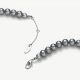 Dove Grey Water Pearl Necklace, a subtle and beautiful arrangement of grey water pearls, offering a refined and sophisticated look that effortlessly elevates your style.
