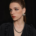 Dove Grey Water Pearl Necklace, a chic and simple necklace adorned with water pearls in a soft dove grey color, creating a versatile accessory that complements any outfit with understated elegance