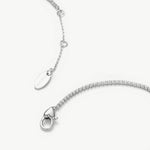 Emerald Rectangle Dewdrop Necklace, with a luxe emerald gleam, this pendant captures the allure of emerald in a rectangle dewdrop, creating an opulent and modern accessory for any outfit.