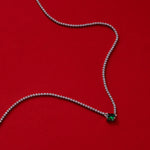 Enchanting Emerald Glow: Rectangle Dewdrop Pendant in Emerald, an enchanting emerald glow that radiates elegance, featuring a radiant emerald rectangle dewdrop on a delicate chain, creating a timeless and stylish accessory