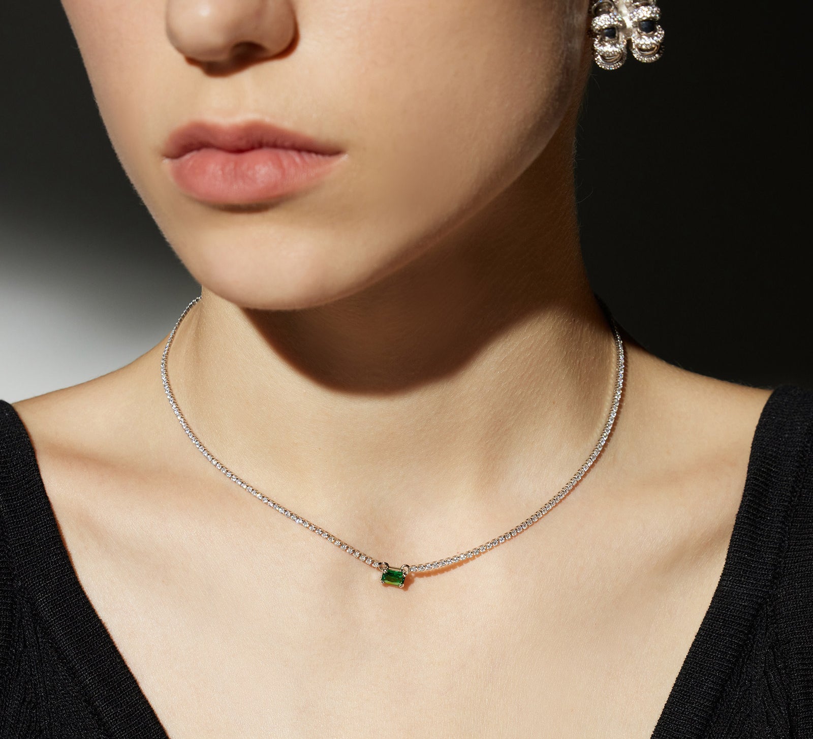 Emerald Rectangle Dewdrop Necklace, making a vivid green statement, this pendant showcases a stunning emerald rectangle dewdrop suspended from a delicate chain, adding a pop of color and modernity to your ensemble