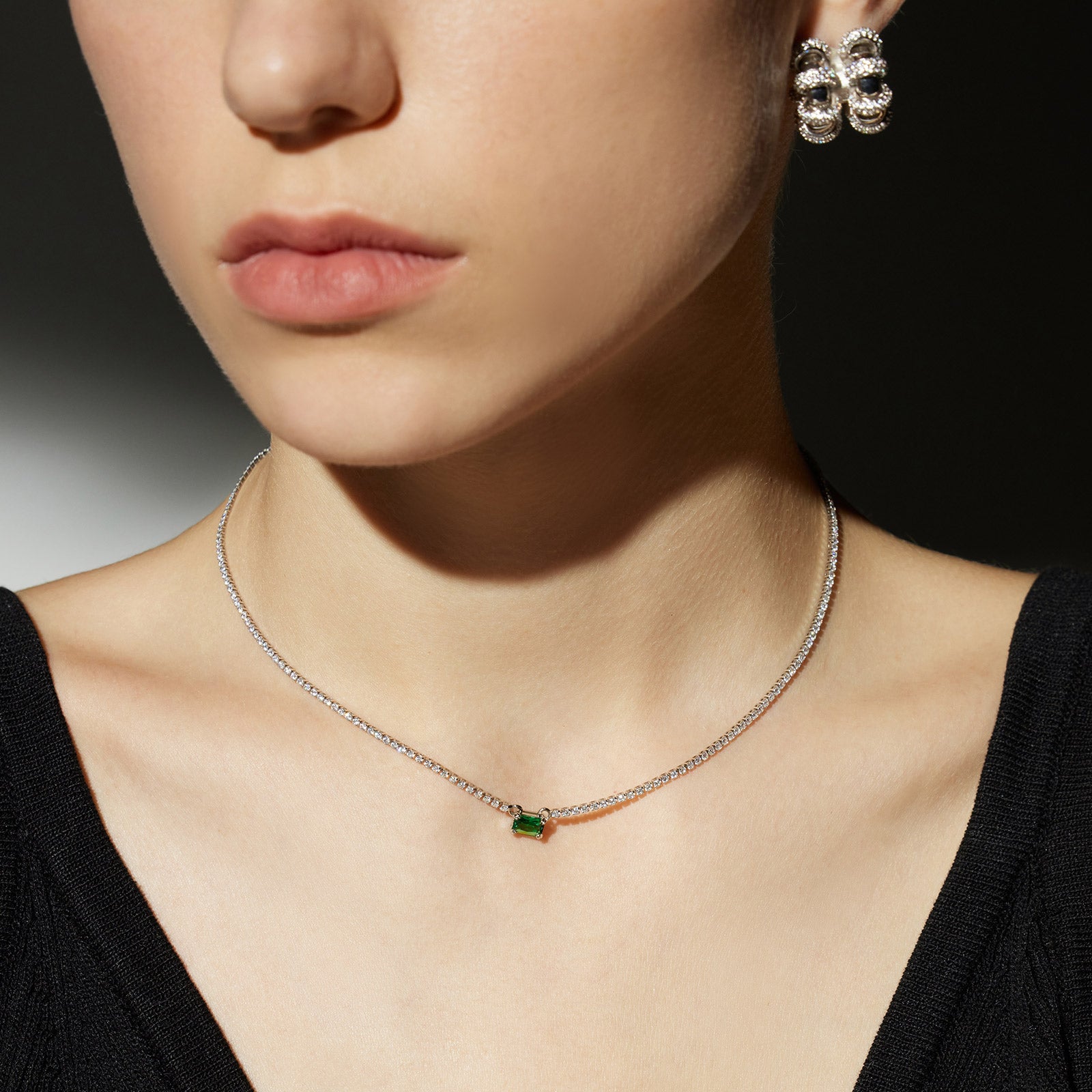 Emerald Rectangle Dewdrop Necklace, making a vivid green statement, this pendant showcases a stunning emerald rectangle dewdrop suspended from a delicate chain, adding a pop of color and modernity to your ensemble