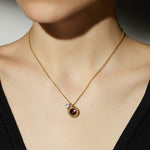 Red Crystal Dew Rose Gold Necklace, making a bold statement in red, this necklace showcases a striking red crystal dew pendant on a rose gold chain, adding a pop of color and vibrancy to your ensemble.