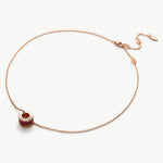 Red Ring Pendant Necklace, a modern take on romance, this necklace features a red ring pendant on a delicate chain, creating a contemporary and stylish accessory for expressing love and style