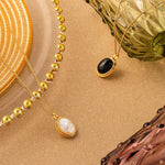 White Agate Gold Pendant Necklace, exuding pure radiance, this necklace showcases a radiant gold chain with a captivating white agate pendant, adding a touch of glamour and grace to your neckline.