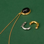 Gold Pendant Necklace with Black Agate, a necklace that exudes dramatic sophistication, featuring a gold chain and a statement black agate pendant, making it a standout and stylish addition to your jewelry collection