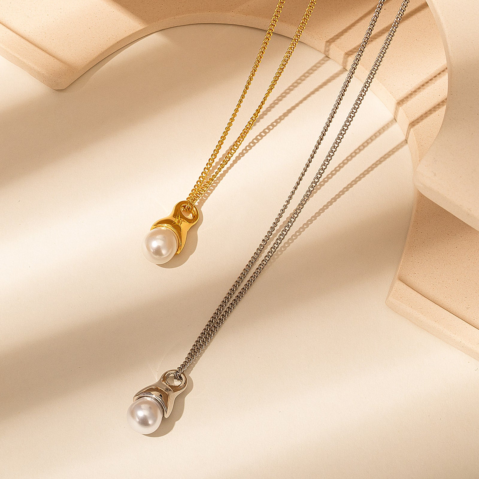 Gold Pearl Drop Pendant Necklace, unveiling the grace of gold, this necklace features a mesmerizing pearl drop pendant in a rich gold hue, creating a captivating and versatile accessory.