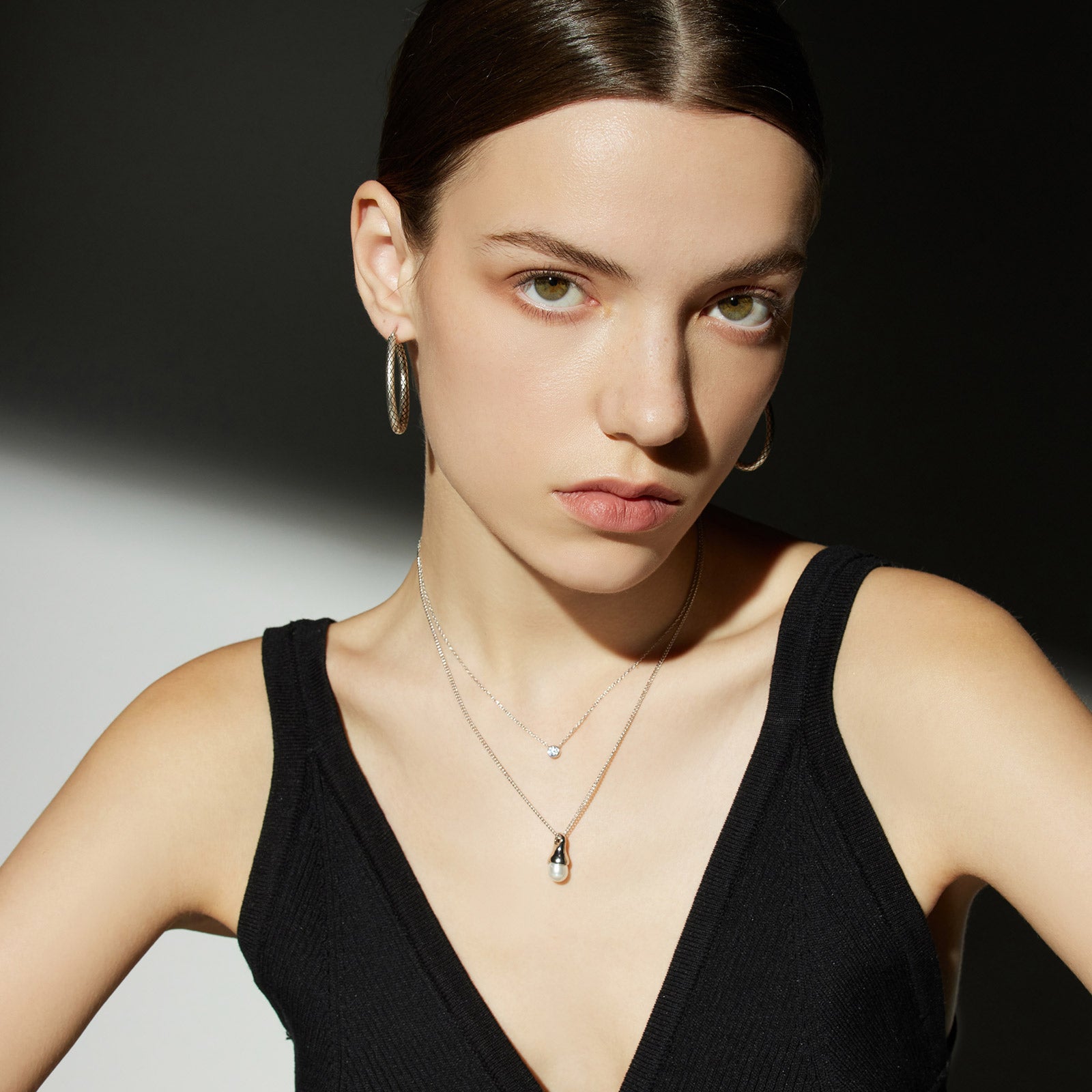 Platinum Pearl Drop Pendant Necklace, a chic platinum accent that enhances your style, featuring a stylish pearl drop pendant in a lustrous platinum hue