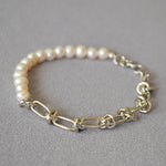 Molten Baroque Pearl Twisted Chain Bracelet, coiled with a touch of platinum luxury, this bracelet adds a hint of glamour and sophistication to your wrist, making it perfect for special occasions