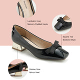 Black Patent Leather Block Heel Pumps, perfect for adding a touch of city glamour to your ensemble.