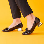 Black Block Heel Pumps in Patent Leather, a modern and fashionable option for city living