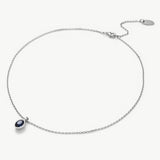Agate Pendant Necklace in Sapphire, a deep sapphire charm captured in an agate pendant, creating a stylish and timeless accessory to add a pop of color to your ensemble.