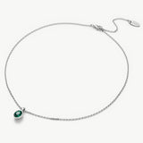 Agate Pendant Necklace in Emerald, a lush emerald charm captured in an agate pendant, creating a stylish and timeless accessory to add a pop of color to your ensemble