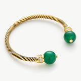  Gold Agate Bracelet adorned with green gemstones, this bracelet radiates with the captivating glow of green agate, adding a touch of radiant beauty to your wrist in a vintage-inspired setting