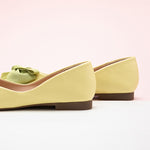 Elegant women's footwear in yellow-green with a stylish bowknot