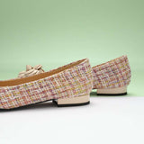 Beige tweed flats featuring a stylish camellia pattern