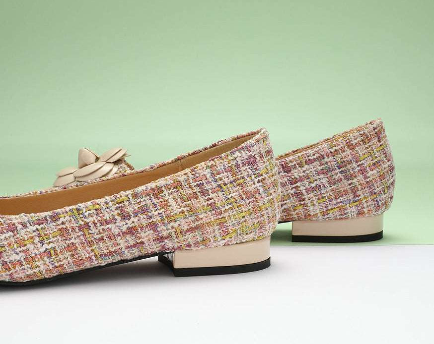 Beige tweed flats featuring a stylish camellia pattern