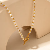 Gold Pearl Beaded Necklace, symbolizing opulent beauty, this necklace showcases the richness of gold and the timeless allure of pearls, creating a sophisticated and versatile accessory