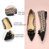 Chic and sophisticated black Camellia tweed shoes