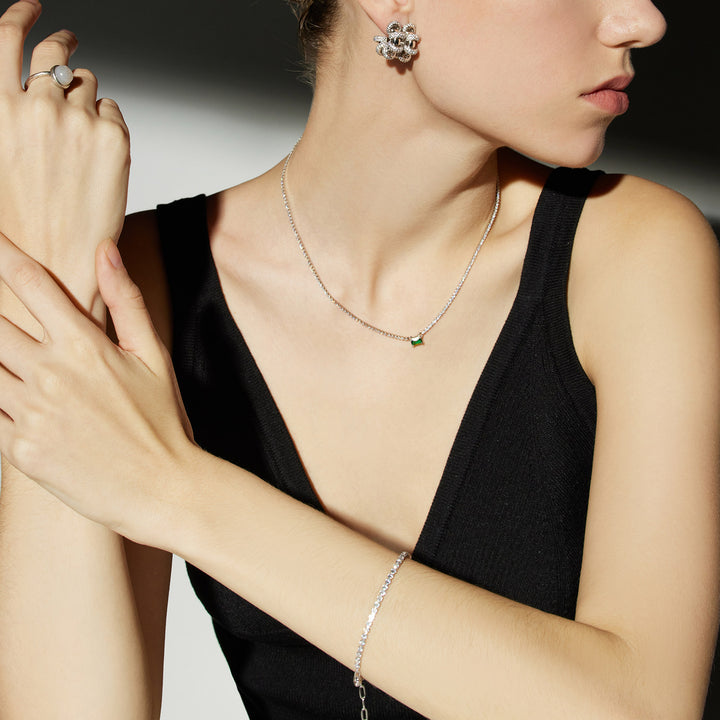 Crystal Bracelet, cascading with platinum twinkle, this bracelet features a cascade of crystals in a platinum hue, creating a mesmerizing and glamorous accessory that elevates your overall look
