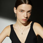  Crystal Pendant Necklace in Gold, showcasing a timeless gold pendant that adds a touch of elegance and sophistication to your neckline
