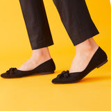 Black Suede Ballet Flats, a modern and edgy option for city living with a touch of sophistication.