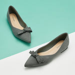 Azure Allure: Blue Suede Ballet Flats, providing a touch of ocean-inspired charm to your ensemble