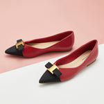 Chic Statement: Red Leather Flats with embellishments, perfect for making a bold and confident fashion statement