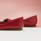 Elegant Crimson: Embellished Leather Flats in Red, a vibrant and versatile addition to your shoe collection