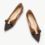Stylish brown leather flats with tasteful embellishments