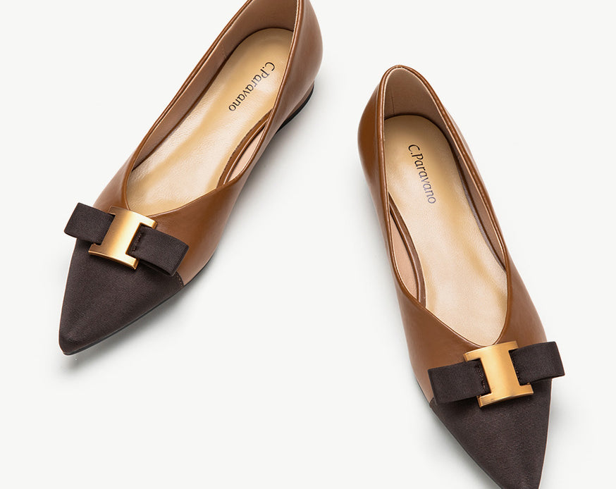 Stylish brown leather flats with tasteful embellishments