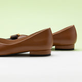 Embellished Brown Leather Flats, featuring stylish details for a classic and refined style