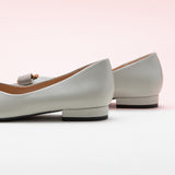 City Chic: Embellished Grey Leather Flats, featuring stylish details for a modern and urban style