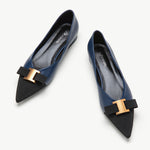 Navy leather flats with elegant embellishments for a timeless look