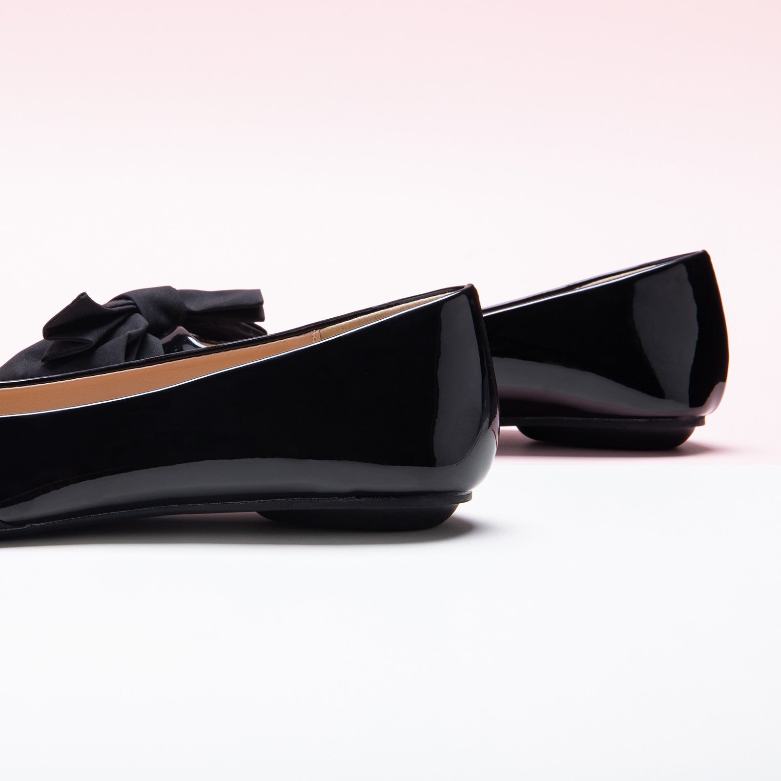 Black Bow-Embellished Off-Center Flats: Classic and Versatile