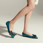 Blue Bow-Embellished Off-Center Flats: Versatile and Stylish