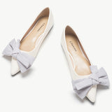 Elegant ivory Bow-Embellished Off-Center Flats, a sophisticated and charming choice