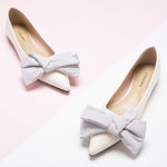 Ivory Bow-Embellished Off-Center Flats: Classic and Chic