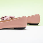Step into sophistication with these ivory off-center flats featuring a chic bow embellishment, perfect for a polished and refined look