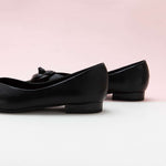 Black Camellia Soft Leather Flats: Timeless Style.