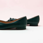 Elegant Green Leather Flats with Camellia Embellishment.