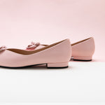 Elegant Pink Leather Flats with Camellia Embellishment.
