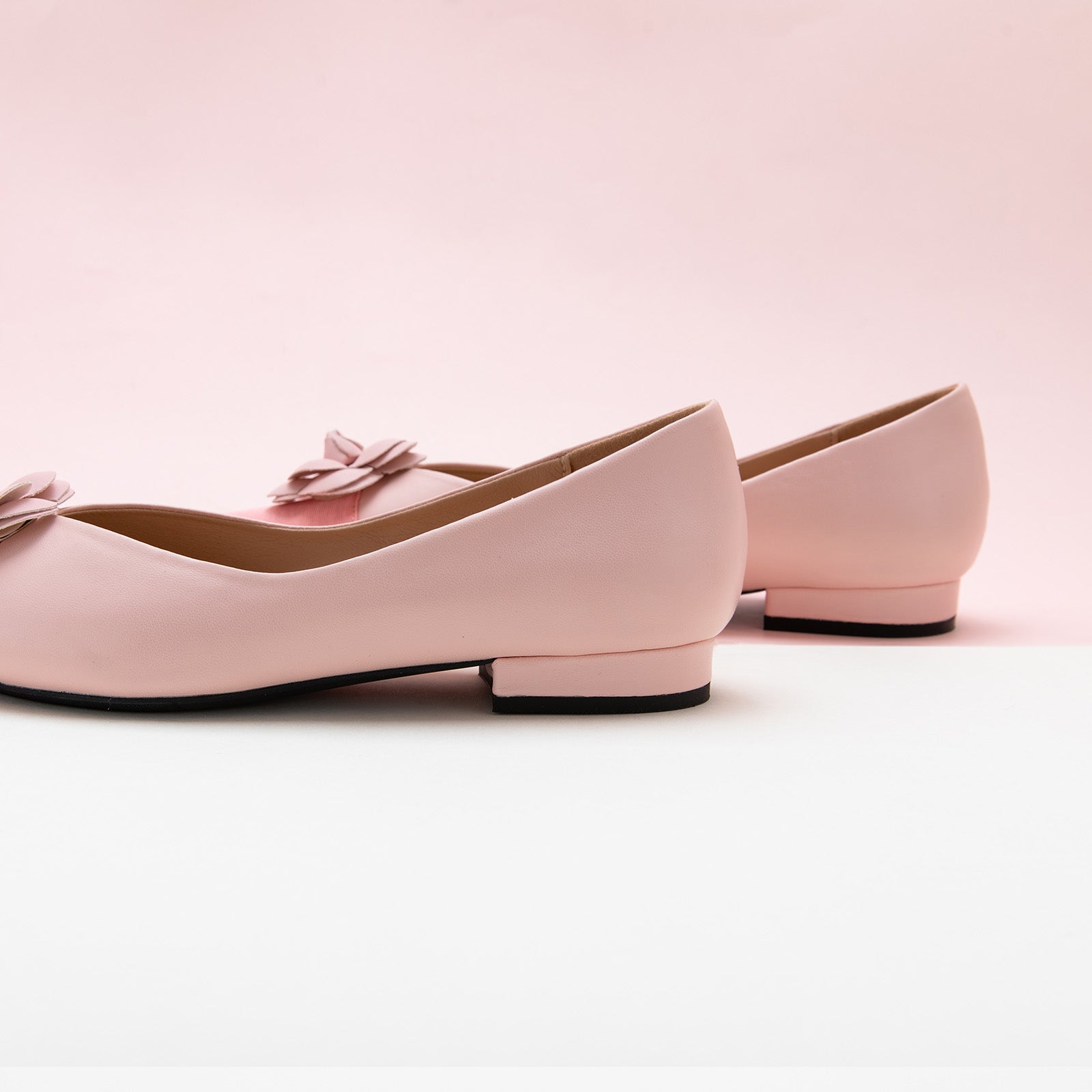 Elegant Pink Leather Flats with Camellia Embellishment.