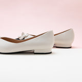 White Camellia Soft Leather Flats: Timeless Wardrobe Staple.