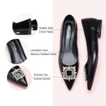 Make a chic statement with these black flats showcasing a crystal buckle, adding a touch of modern elegance to your ensemble