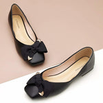 Chic black bowknot square flats for a fashionable look.